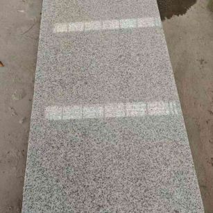 重庆芝麻白光面毛板